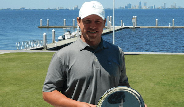 Joseph Deraney holds 2016 Timuquana Cup trophy <br>(Photo Courtesy of Clint Avret)</br>