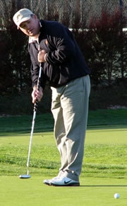 - a crucial two putt at No. 18 led to victory