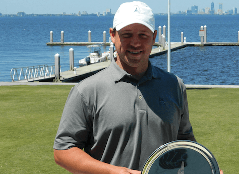 Joseph Deraney holds 2016 Timuquana Cup trophy <br>(Photo Courtesy of Clint Avret)</br>