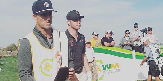 Matthew Wolff (right) and caddie George Gankas
